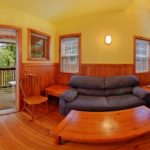 One Bedroom Cottage A: Living room + sofa bed ucluelet family holiday